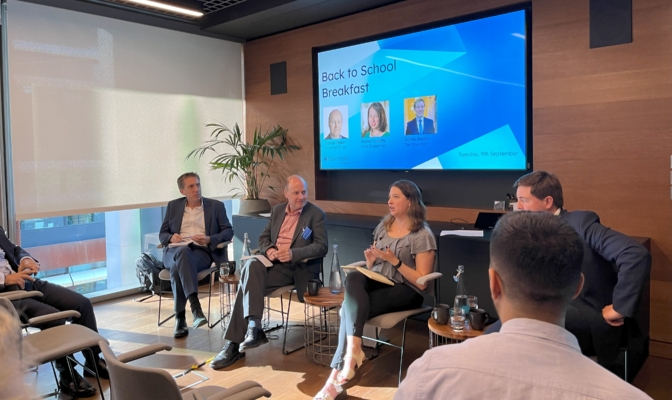journalists sat in a panel event